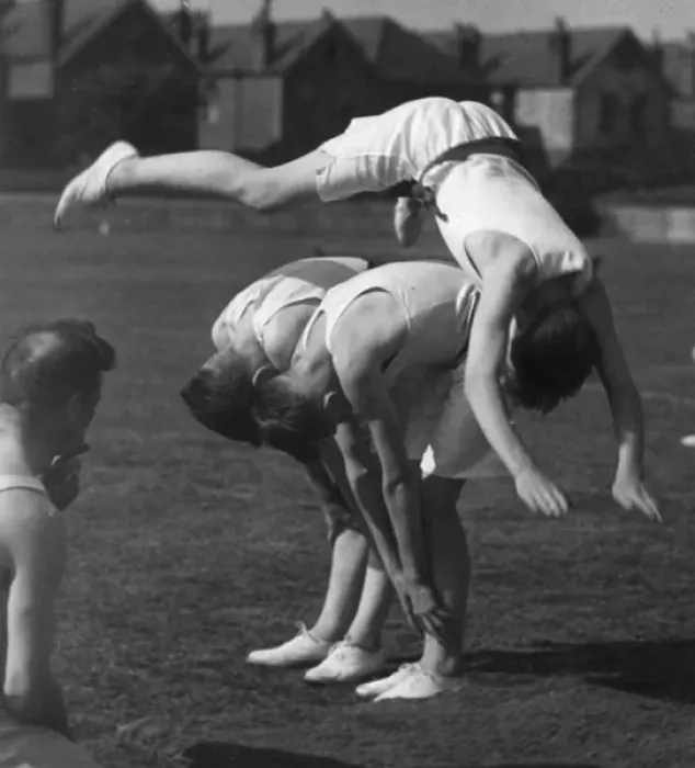 Framed Print : LEAPFROG. A boy doing an impressive leapfrog over two other boys! Date: 1930s Framed Print : LEAPFROG. A boy doing an impressive leapfrog over two other boys! Date: 1930s