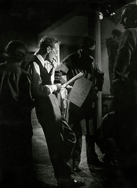 Leslie Howard concentrating on his lines