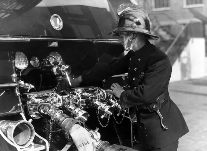 Framed Print : LFB firefighter with new motor pump Framed Print : LFB firefighter with new motor pump