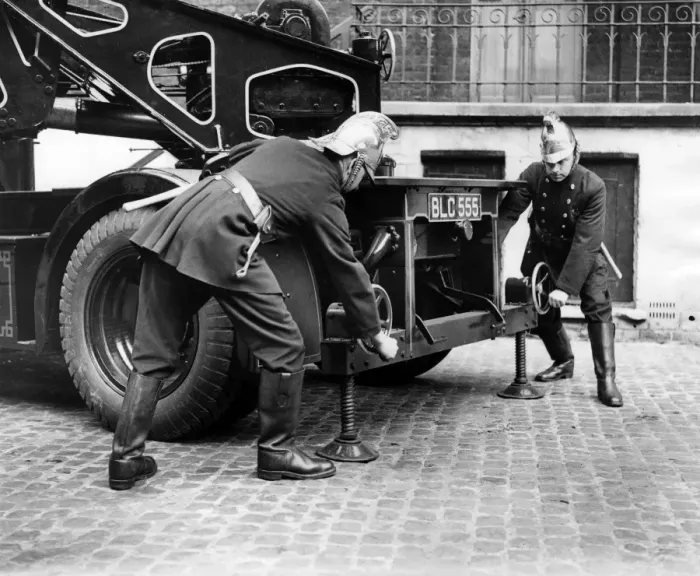 Framed Print : LFB firefighters adjusting back of vehicle Framed Print : LFB firefighters adjusting back of vehicle