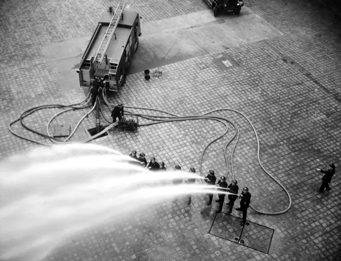 Framed Print : LFB firefighters in multi-hose display Framed Print : LFB firefighters in multi-hose display