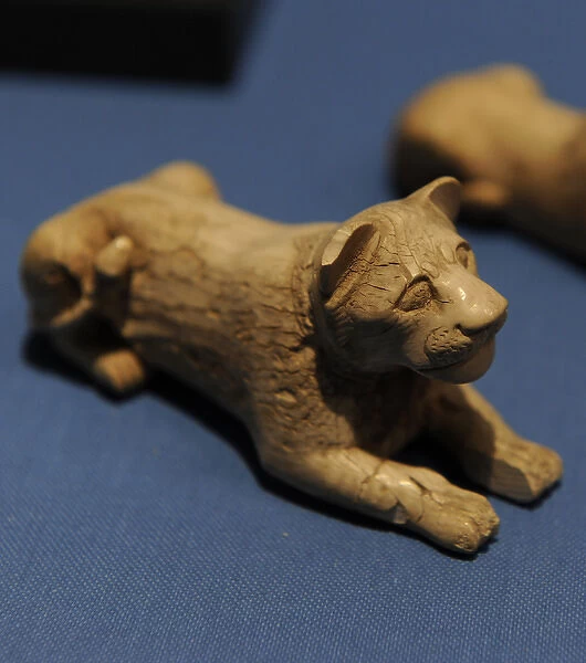 Lion-shaped piece of game. Ivory. From a tomb in Abydos. Ear