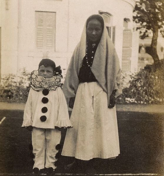 Little boy dressed as a clown - and his nurse