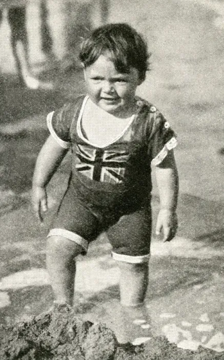 Framed Print : Little boy at the seaside in patriotic British swimsuit Framed Print : Little boy at the seaside in patriotic British swimsuit