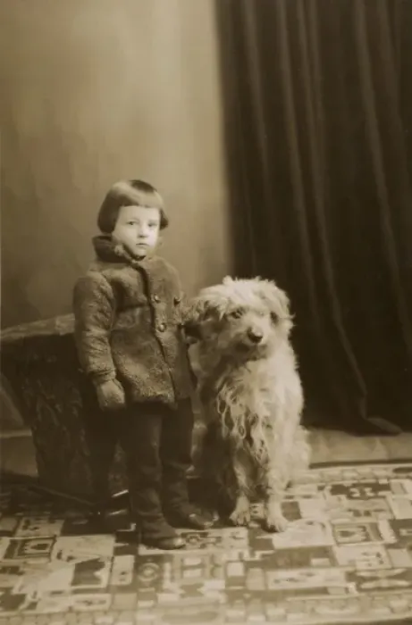 Framed Print : Little boy in his winter woollies and the family pet dog Framed Print : Little boy in his winter woollies and the family pet dog