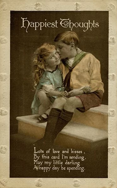 Little girl and boy holding hands and kissing