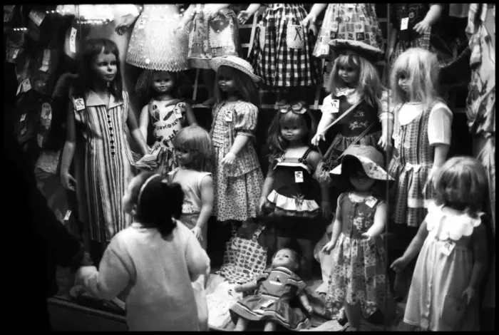 Framed Print : Little girl and dress and doll shop window Alexandria, Egypt Framed Print : Little girl and dress and doll shop window Alexandria, Egypt