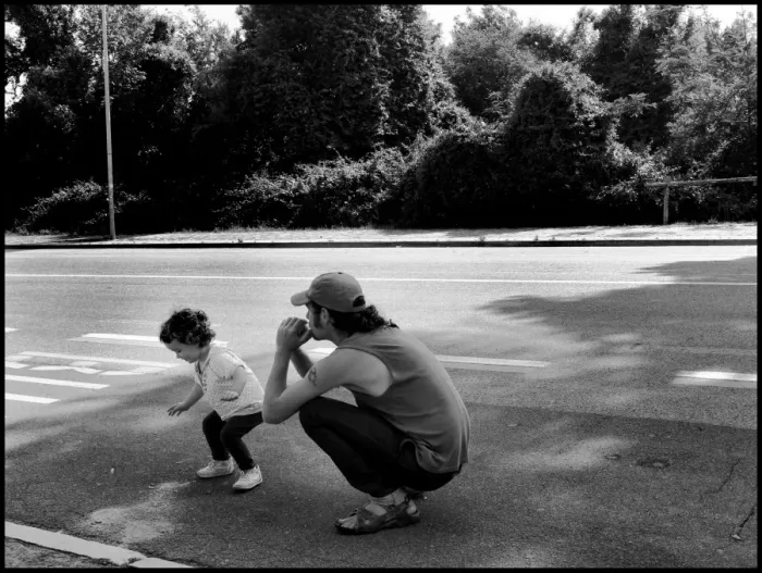 Framed Print : Little girl and her father waiting for bus Italy Framed Print : Little girl and her father waiting for bus Italy