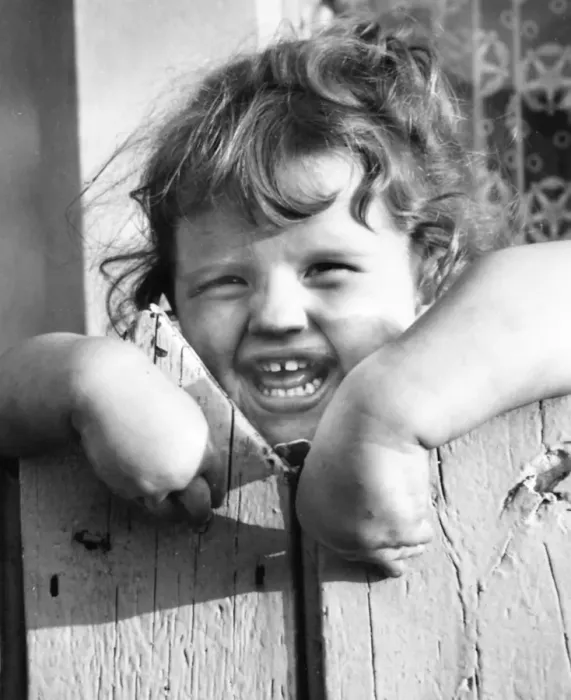 Framed Print : Little girl behind a fence, Balham, SW London Framed Print : Little girl behind a fence, Balham, SW London