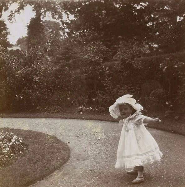 Little girl in garden, Ealing, West London