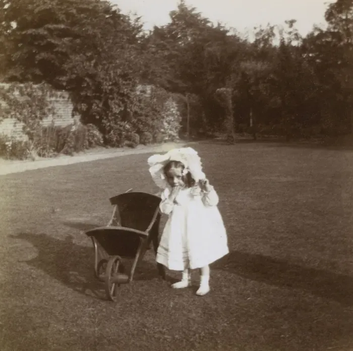 Framed Print : Little girl in garden, Ealing, West London Framed Print : Little girl in garden, Ealing, West London