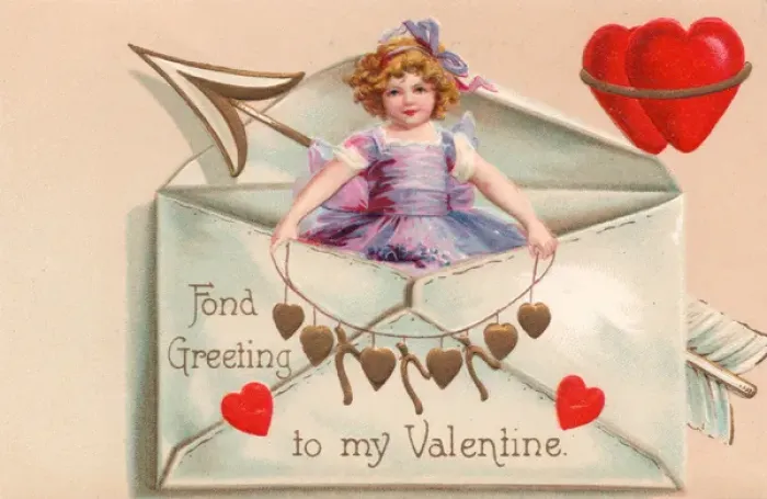 Framed Print : Little girl with hearts in an envelope on a Valentine card Framed Print : Little girl with hearts in an envelope on a Valentine card