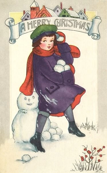 Little girl holding snowballs