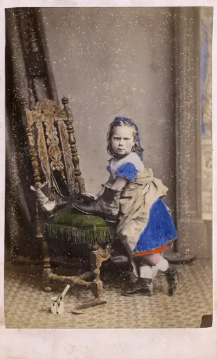 Framed Print : Little girl polishing her Fathers boots - studio portrait Framed Print : Little girl polishing her Fathers boots - studio portrait
