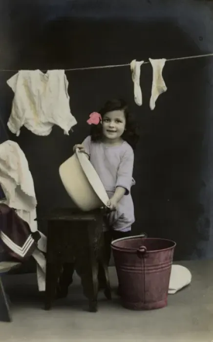 Framed Print : Little girl on a postcard, hanging up the washing Framed Print : Little girl on a postcard, hanging up the washing