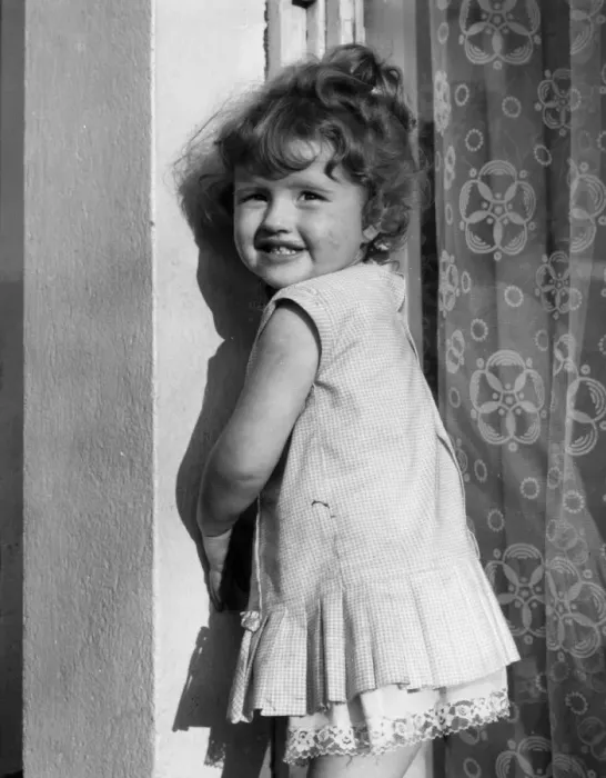 Framed Print : Little girl smiling, Balham, SW London Framed Print : Little girl smiling, Balham, SW London