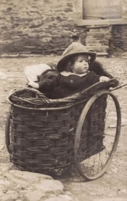 Framed Print : Little girl in a wicker pram Framed Print : Little girl in a wicker pram