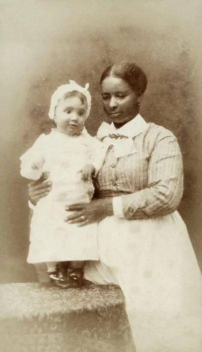 Framed Print : Little white toddler with her black nanny Framed Print : Little white toddler with her black nanny