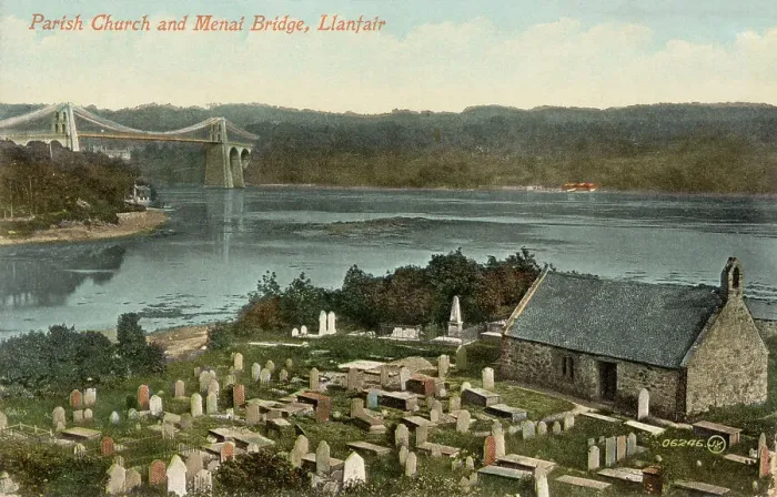 Framed Print : Llanfair parish church and graveyard, with Telford's Menai suspension bridge, opened 1826, spanning the straits in the distance. Date: 1909 Framed Print : Llanfair parish church and graveyard, with Telford's Menai suspension bridge, opened 1826, spanning the straits in the distance. Date: 1909