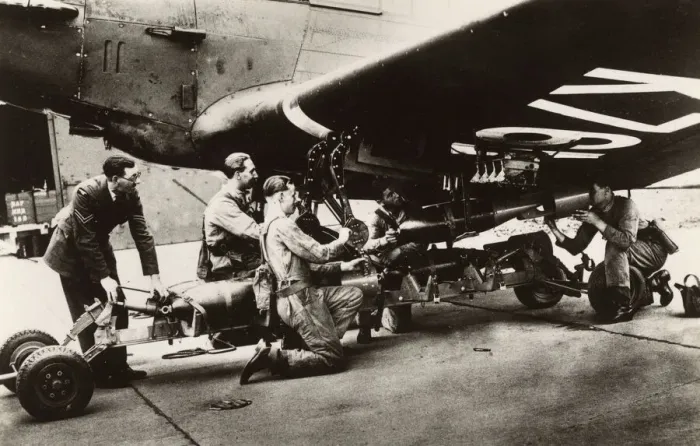 Framed Print : Loading Bombs onto an RAF Bomber prior to a patrol flight Framed Print : Loading Bombs onto an RAF Bomber prior to a patrol flight
