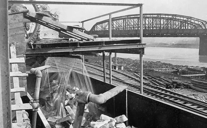 Framed Print : Loading pig iron into railroad cars at steelworks