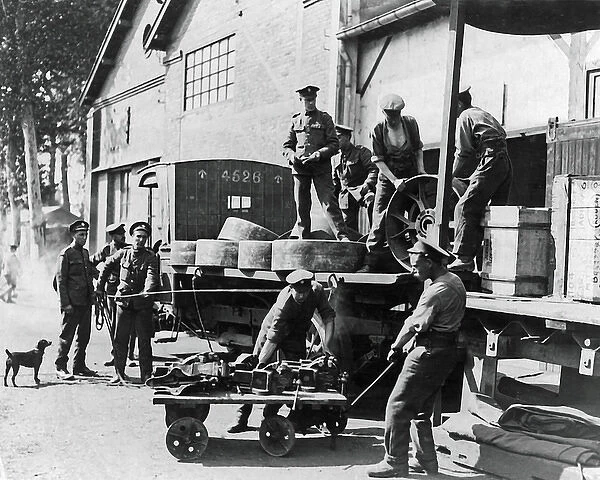 Loading spare motor parts, Western Front, WW1