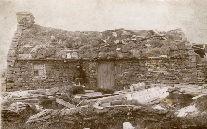 Framed Print : A Local Woman of the Orkney Islands outside her house