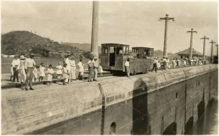 Framed Print : Locals gather along the canal to see the passing of a ship Framed Print : Locals gather along the canal to see the passing of a ship