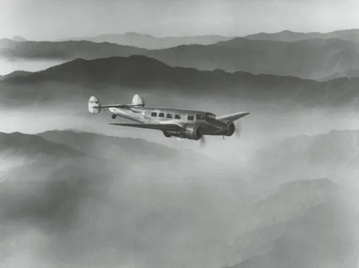 Framed Print : Lockheed L-10 Electra above misty hills Framed Print : Lockheed L-10 Electra above misty hills
