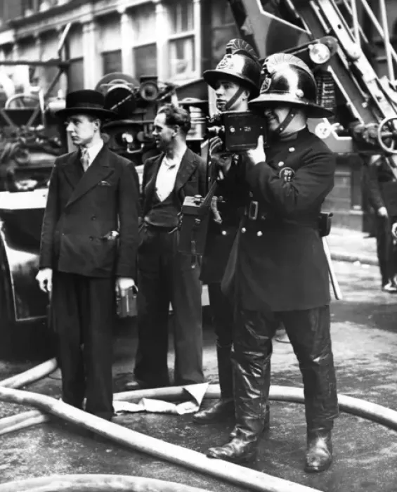 Framed Print : London Fire Brigade cinematographer at work Framed Print : London Fire Brigade cinematographer at work