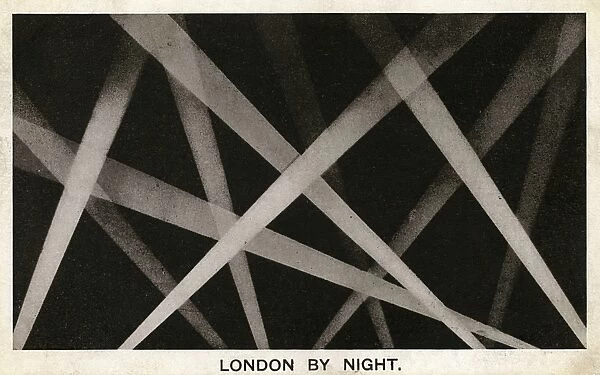 London by Night - Searchlights crossing the night sky
