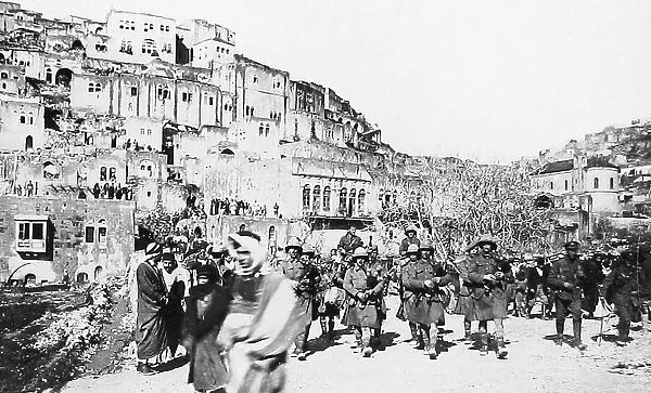 London Scottish Regiment marching through Es Salt during WW1