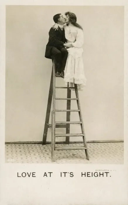 Framed Print : Love at its Height - a couple embrace at top of stepladder Framed Print : Love at its Height - a couple embrace at top of stepladder