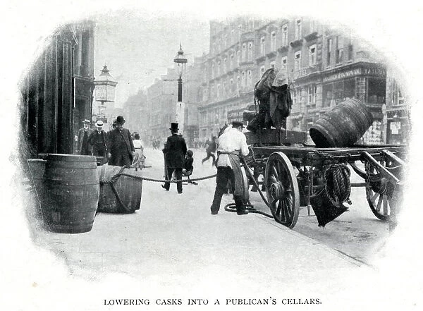 Lowering casks into cellar 1900