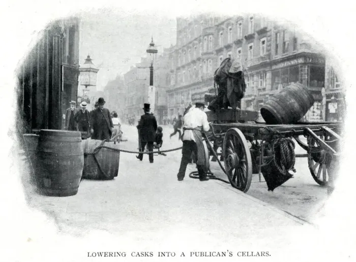 Framed Print : Lowering casks into cellar 1900