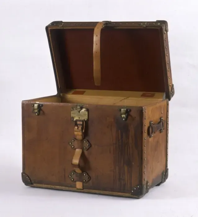 Framed Print : Luggage. A large leather-bound trunk with straps, buckles and locks Framed Print : Luggage. A large leather-bound trunk with straps, buckles and locks