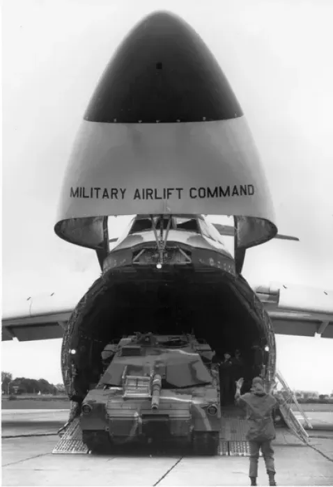 Framed Print : An M-1 Abrams tank leaves a Lockheed C-5A Galaxy Framed Print : An M-1 Abrams tank leaves a Lockheed C-5A Galaxy