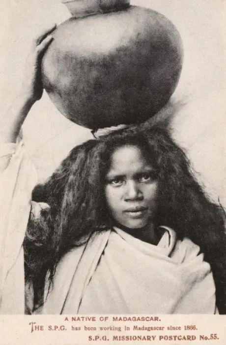 Framed Print : Madagascar - Girl carrying a large round jar Framed Print : Madagascar - Girl carrying a large round jar