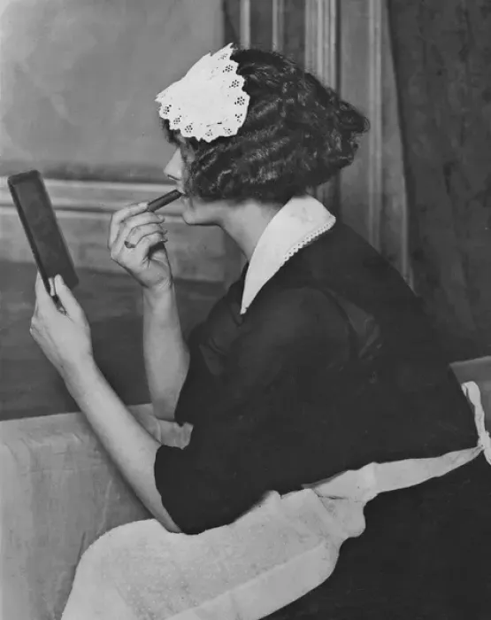 Framed Print : Maid applying lipstick Framed Print : Maid applying lipstick