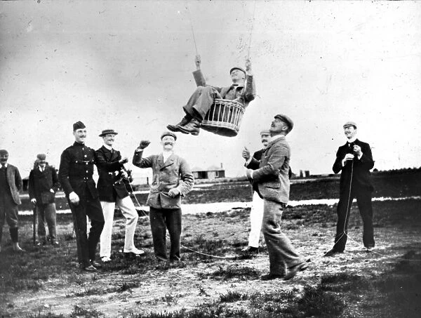 Major Baden-Powell demonstrating his man-lifting kite