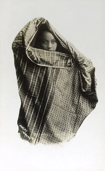 Malaysia - Woman wrapped in local cloth