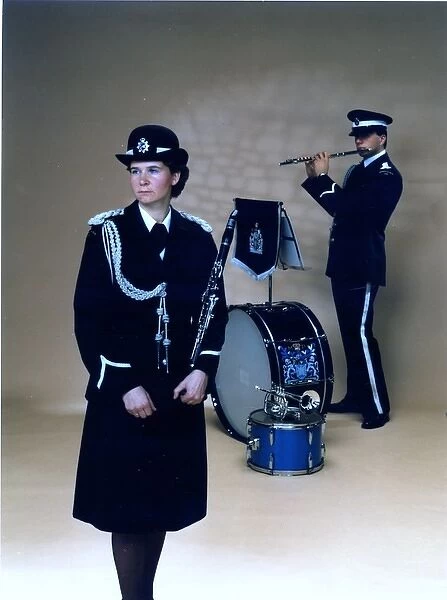 Male and female police band members, London