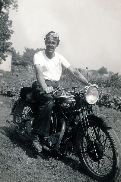Man on 1936 BSA motorcycle