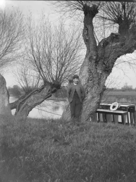 Framed Print : Man on canal bank with canal boat, South Wales Framed Print : Man on canal bank with canal boat, South Wales