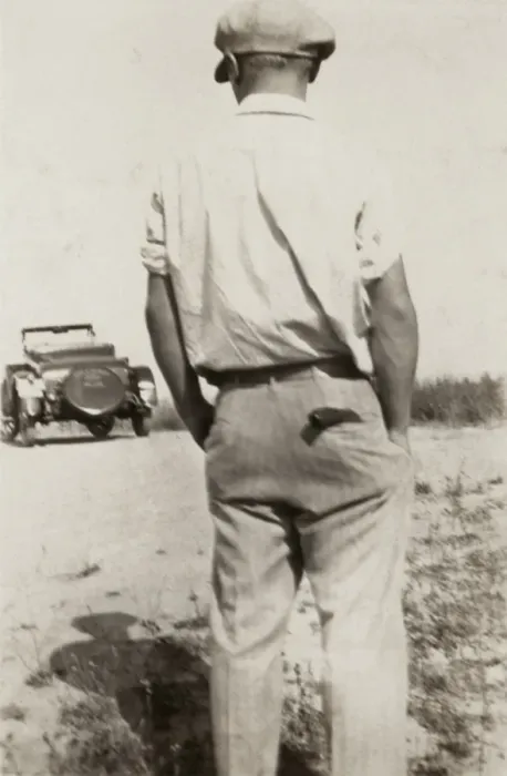 Framed Print : Man and his car (in distance) Framed Print : Man and his car (in distance)