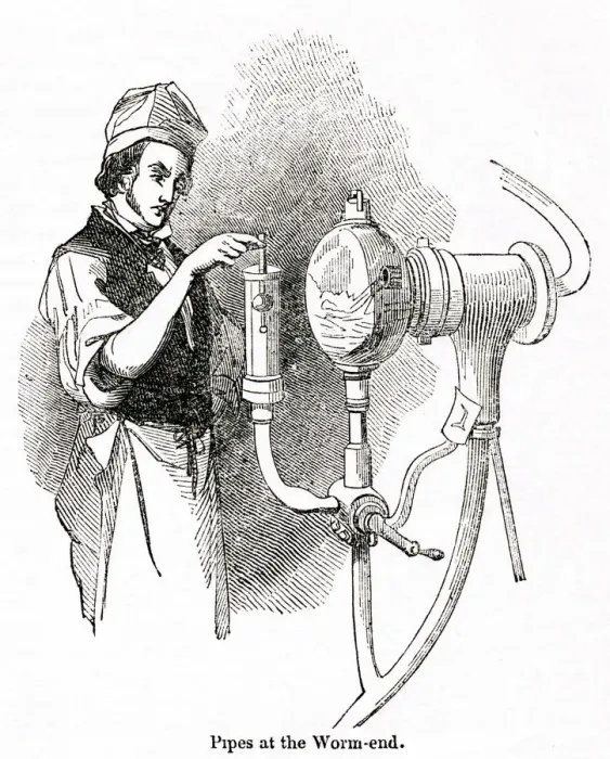Framed Print : Man checking pipes at a distillery, south-west London Framed Print : Man checking pipes at a distillery, south-west London