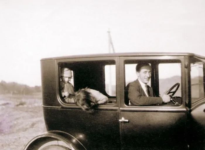 Framed Print : Man and two children in a car Framed Print : Man and two children in a car