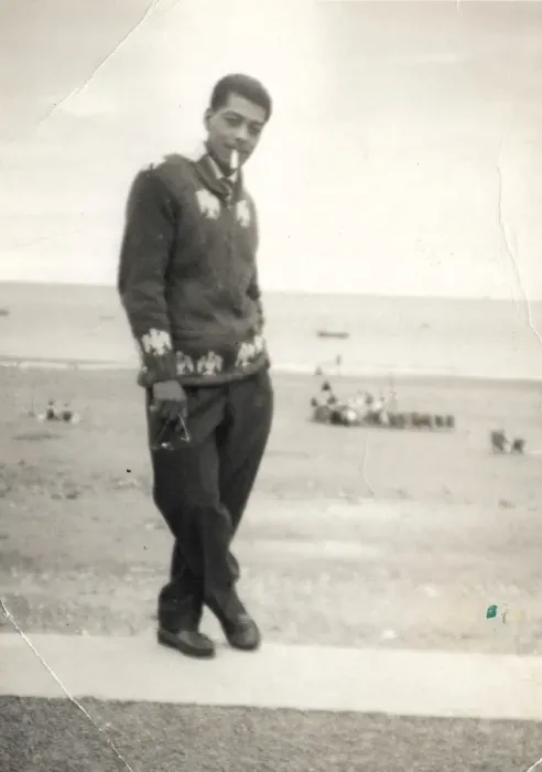Framed Print : Man with cigarette and knitted cardigan standing on the beac Framed Print : Man with cigarette and knitted cardigan standing on the beac