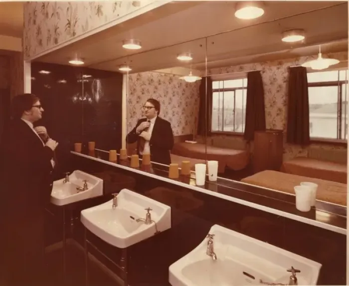 Framed Print : Man in dormitory at Baden Powell House, London Framed Print : Man in dormitory at Baden Powell House, London