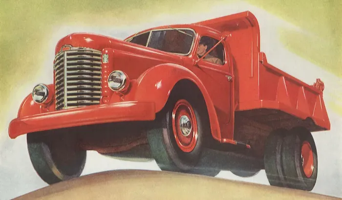 Framed Print : Man Drives Dump Truck Date: 1947 Framed Print : Man Drives Dump Truck Date: 1947